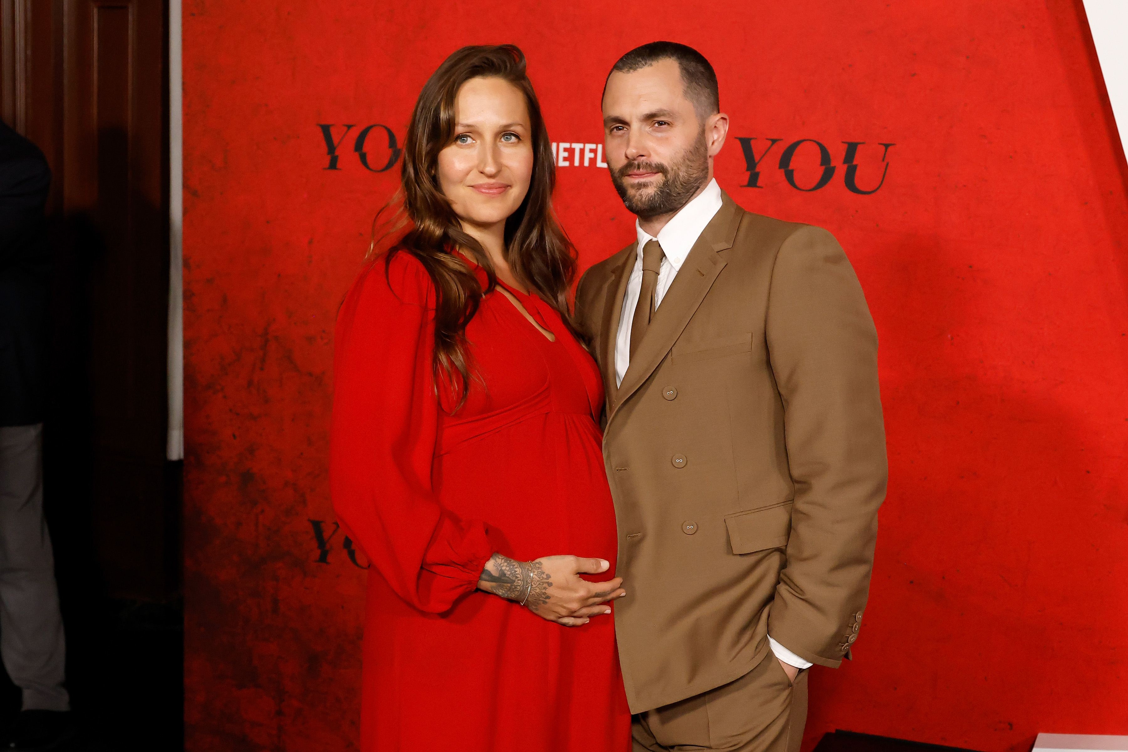 Domino Kirke and Penn Badgley attend a screening for Season 5 of Netflix’s “You” at The Plaza Hotel on April 23, 2025 in New York City.